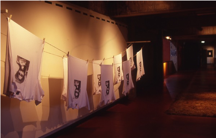 Series of shirts hung on a wash line.