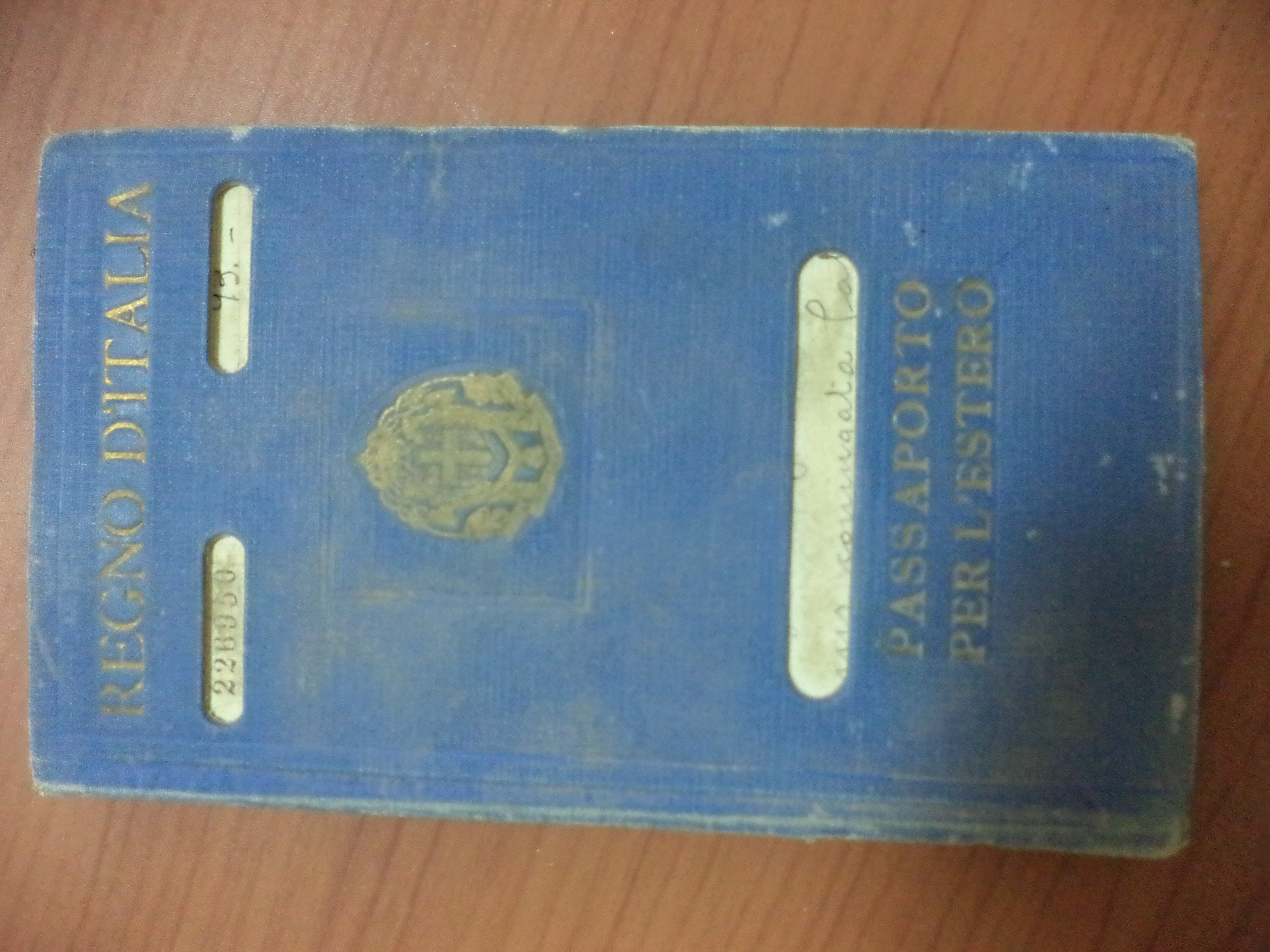 A blue passport on a table