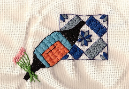 An embroidered design.
